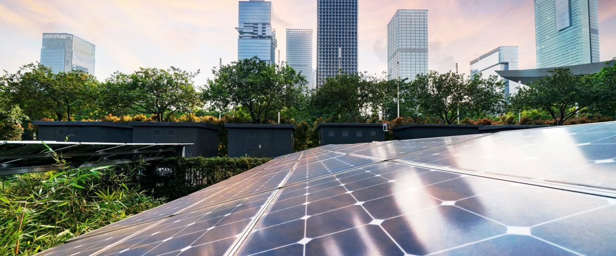 solar panel plant with urban modern building landscape landmarks in sunset,Ecological energy renewable concept